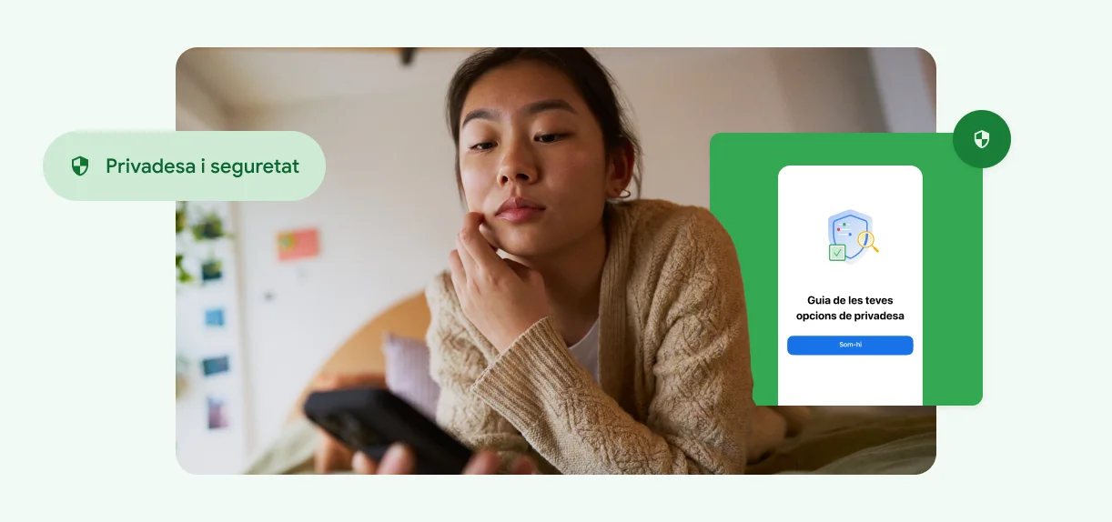 Una dona que es toca la cara i mira el telèfon.